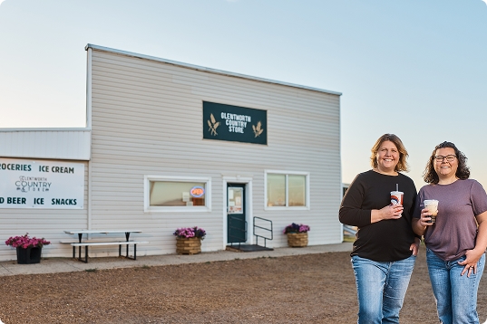 Laurie and Candace standing outside their business